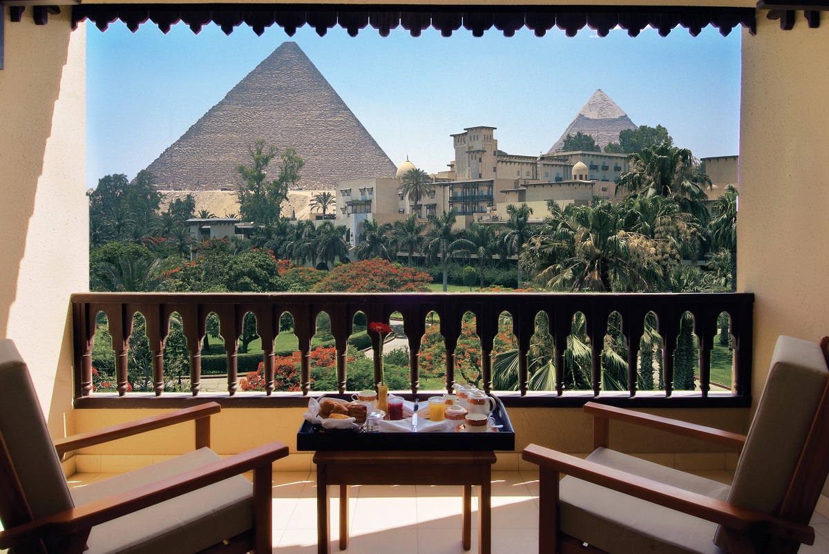 Admire Egyptian pyramids from Mena House Hotel